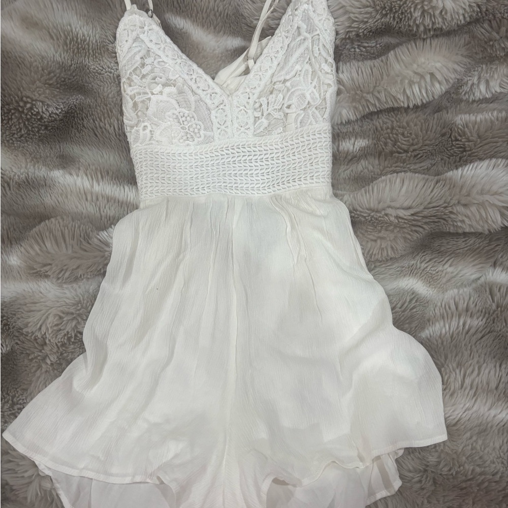 aeropostale white flowy romper with open back